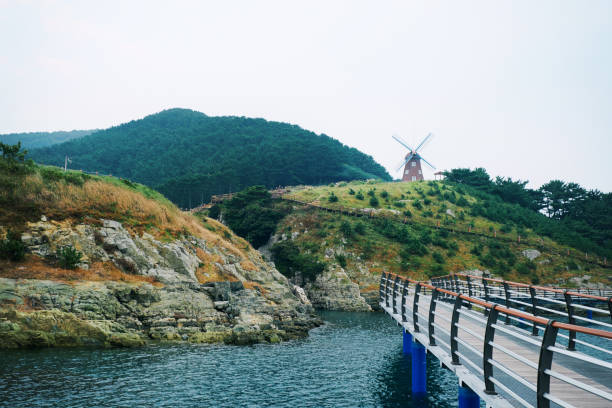 The Hill of Wind is a famous tourist destination in Korea with pretty windmills.