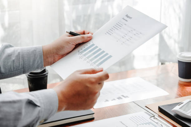 istock Business team meeting Strategy Planning with new startup project plan Finance and Economy Graph with laptop successful teamwork 1383698607