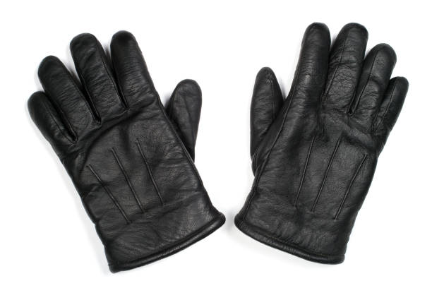 Men's leather gloves on a white background. Close-up haberdashery accessories.