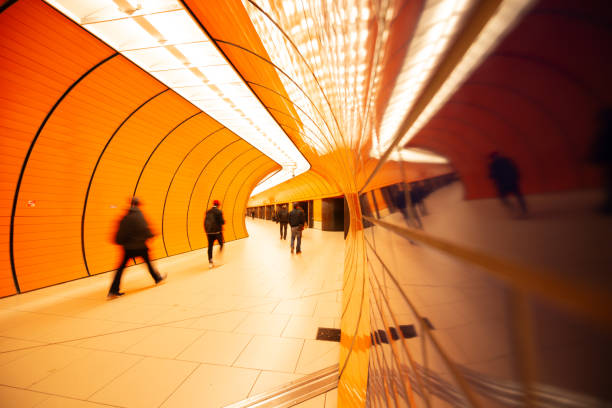 Colorful subway station in Munich Germany with walking people stock photo