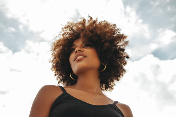 istock Pretty young afro woman 1383824020