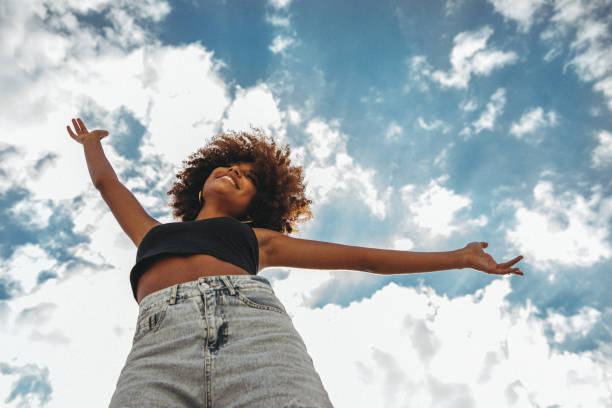 istock Pretty young afro woman 1383824453