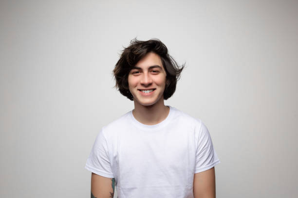 istock Portrait of young handsome man looking at camera 1383827751