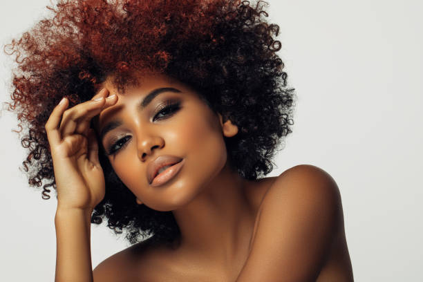 istock Beautiful afro woman with perfect make-up 1383831361