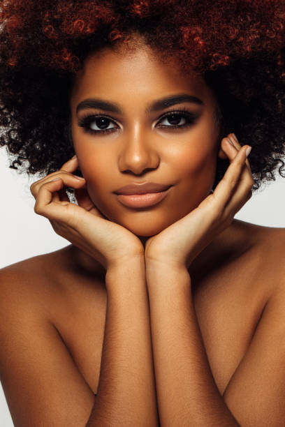 istock Beautiful afro woman with perfect make-up 1383831405