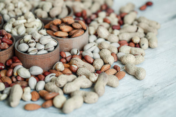 istock Collection of different varieties of nuts. 1383833900