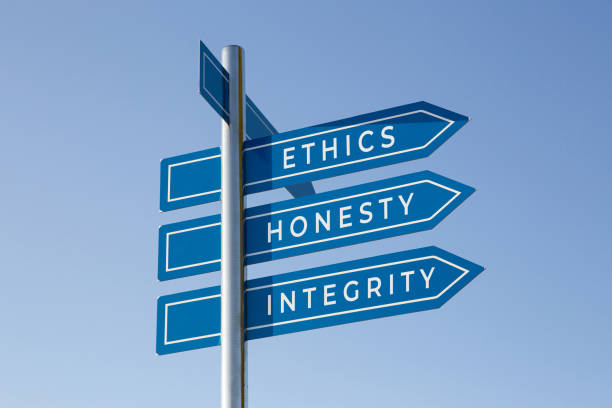 Ethics honesty integrity words on signpost Ethics honesty integrity words on signpost isolated on sky background morality stock pictures, royalty-free photos & images