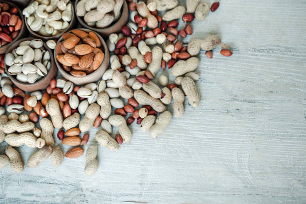 istock Collection of different varieties of nuts. 1383834139