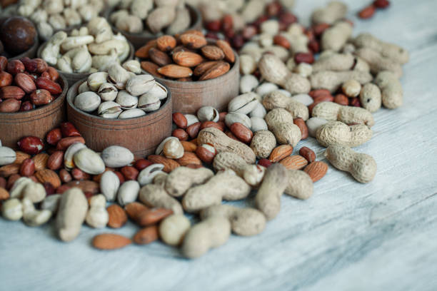 istock Collection of different varieties of nuts. 1383834905