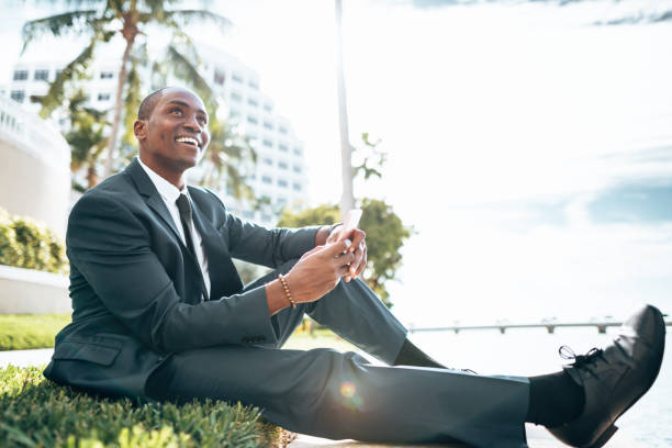 istock business man with smartphone in Miami 1383836223
