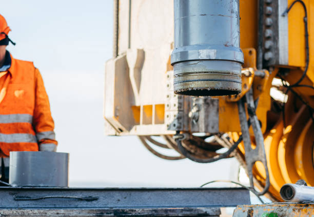 istock Workers start construction of a concrete bridge 1383843453