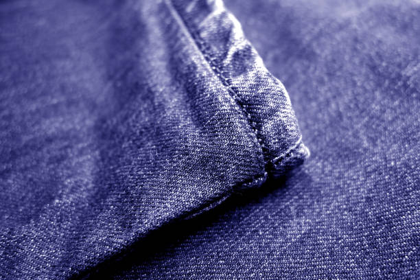 Jeans denim texture with blur effect in blue tone. Abstract background and texture for design.