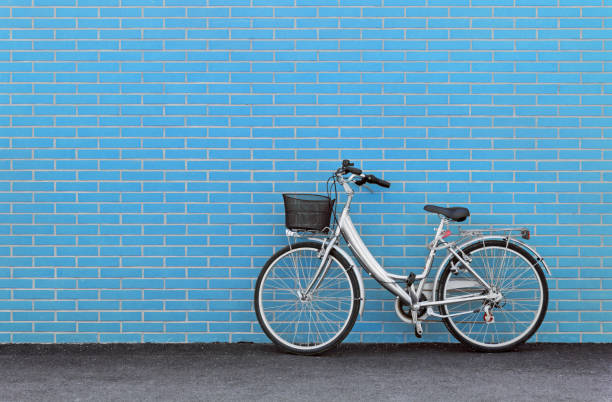 Bicycle against a Turquoise Brick Wall stock photo