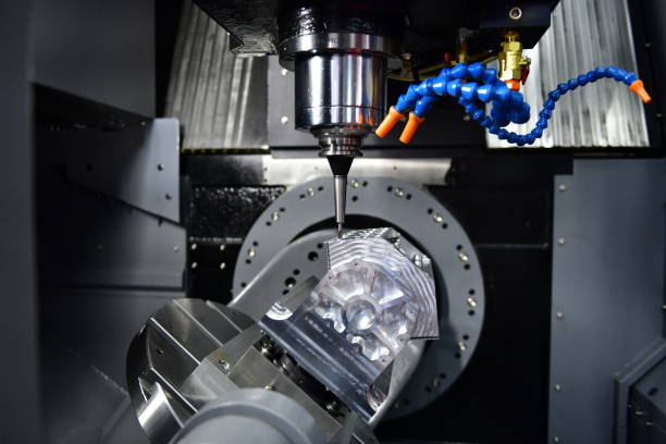 istock The 5-axis CNC mills machines for design configuration that utilizes a swivel head machine table and flush with the surface metalworking 1383852435