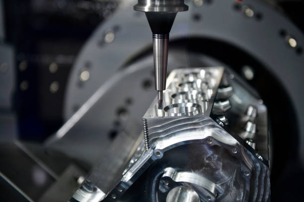 istock The 5-axis CNC mills machines for design configuration that utilizes a swivel head machine table and flush with the surface metalworking 1383853781