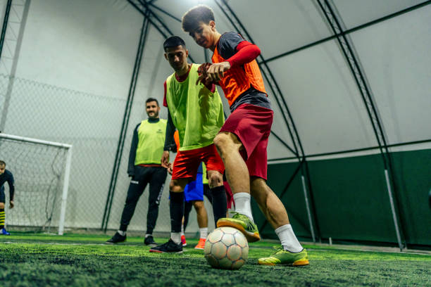 istock Soccer players in action 1383854997