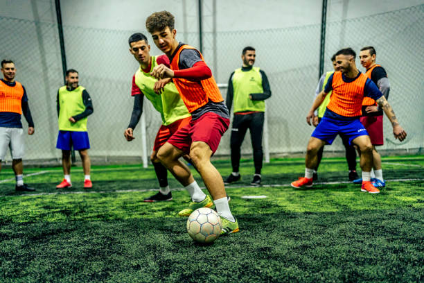 istock Soccer players in action 1383856675