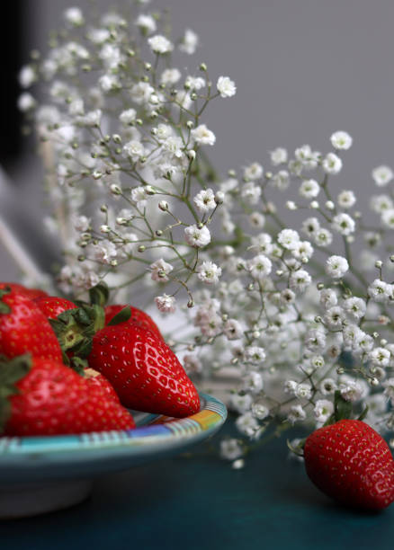 istock Strawberry and flowers 1383857161