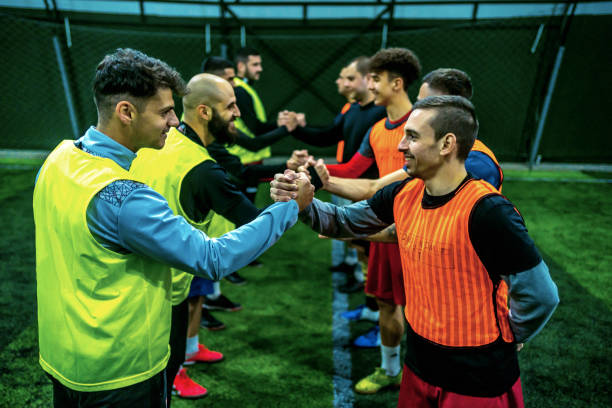 istock Soccer players shaking hands before the match 1383858830