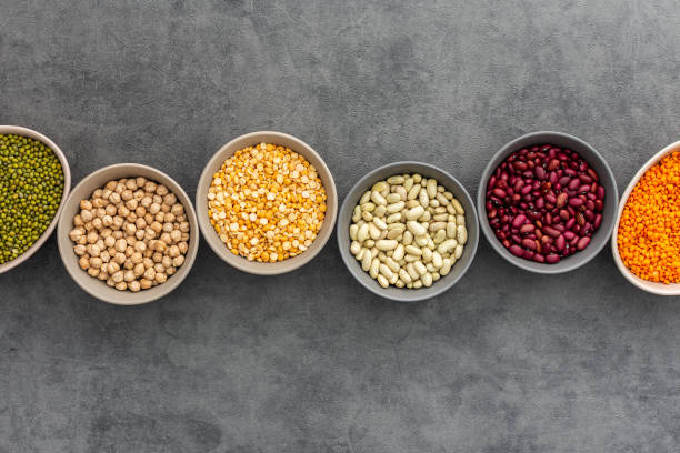 istock Different types of legumes in bowls 1383859079
