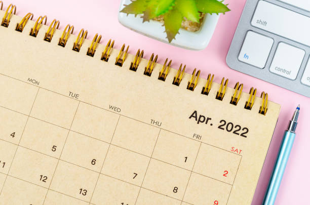 istock April 2022 desk calendar with keyboard computer 1383863168