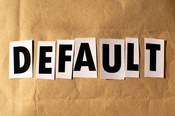 istock default word written on paper . Business and default concept. 1383863857