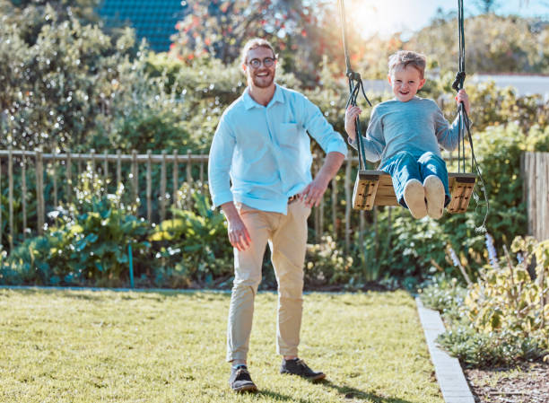 istock Shot of a father and son playing outside 1383866736