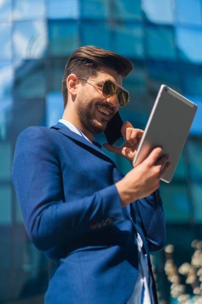 istock Urban businessman is smiling 1383867984