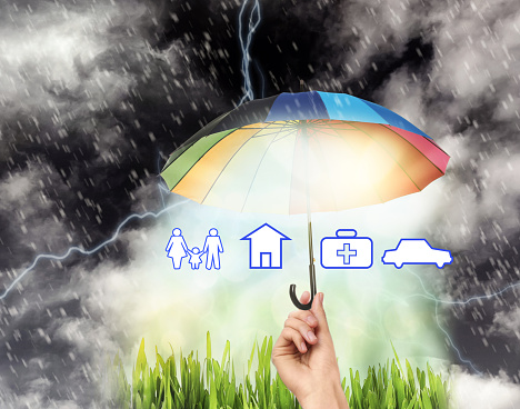 Insurance concept. Woman protecting illustrations with rainbow umbrella from storm, closeup