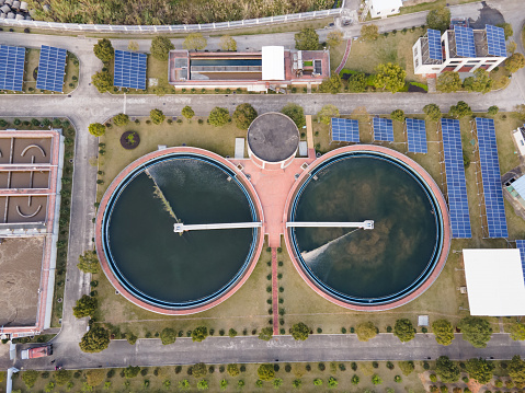 An aerial view of the solar power plant in the afternoon. Solar Sewage Treatment. New Energy Production, environmental protection and Energy Conservation. Photovoltaic solar power generation technology. Solar panels.