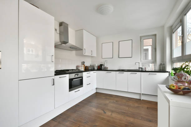 istock Compact kitchen with white furniture 1383884831