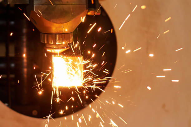 istock cnc laser cutting machine cutting steel square pipe 1383886465