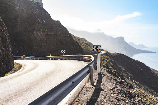 Beautiful and picturesque narrow coastal road through hills of Gran Canaria, Spain.