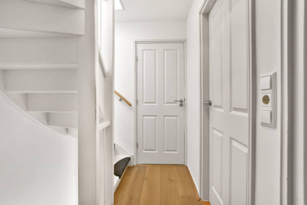 istock Narrow corridor with a carpeted staircase 1383889401