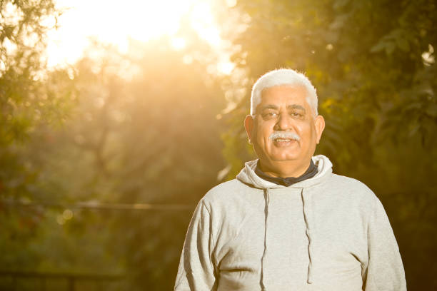 istock Thoughtful senior man at park 1383889710