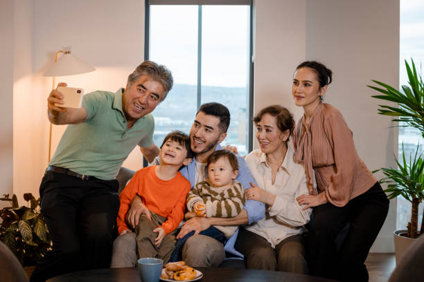 istock Family Taking a Selfie 1383890444