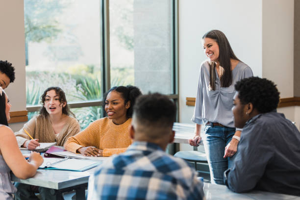 istock Teacher listens nearby 1383890709