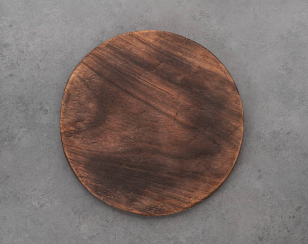 istock Empty wooden board over stone background with copy space 1383890962