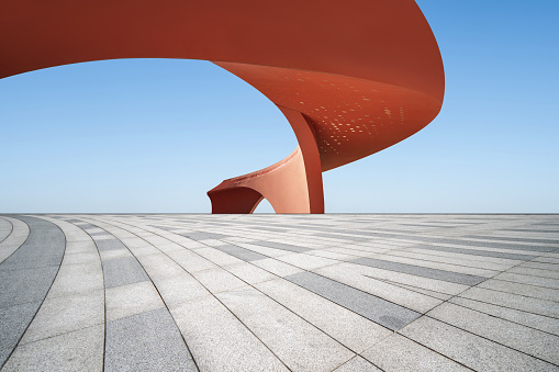 istock Orange abstract buildings and open spaces. 1383893630