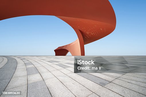 istock Orange abstract buildings and open spaces. 1383893630