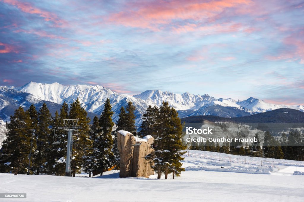 A beautiful morning on the ski slopes in Vail, Colorado Early morning on the ski slopes in Colorado with perfect skiing conditions - with mostly clear skies and cold temperatures. Vail - Colorado Stock Photo