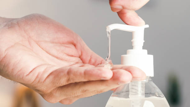 istock Close up of hand presses sanitizing gel 1383919267