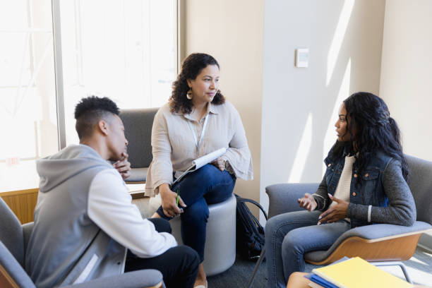 istock Couple meet with church pastor 1383919313