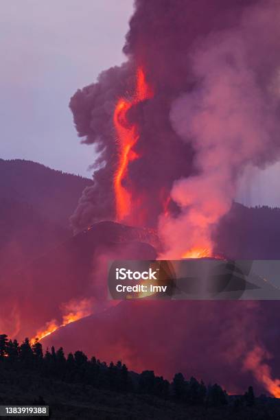 Cumbre Viejas Volcano Eruption Volcanic Cone And Volcanic Bombs Going Dawnhill Huge Ammount Of Gas And Rocks Stock Photo - Download Image Now