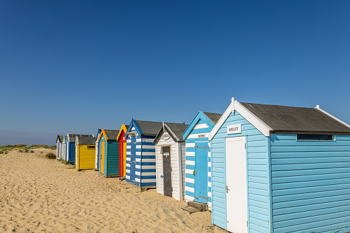 Colourful Beach Huts on Southwold Beach Suffolk