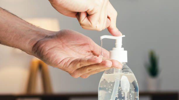 istock Close up of hand presses sanitizing gel 1383931610
