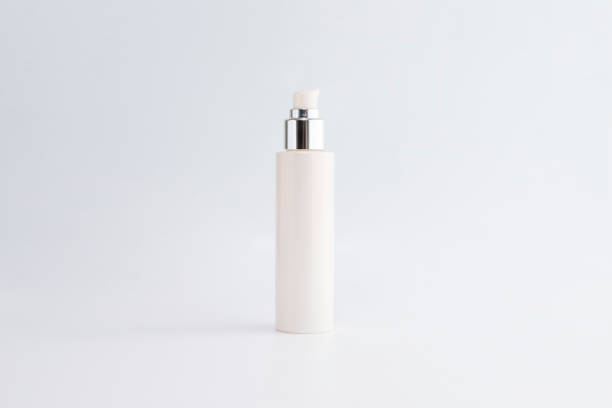 istock blank cosmetic pump top silver bottle mock up on background with copy space 1383931961
