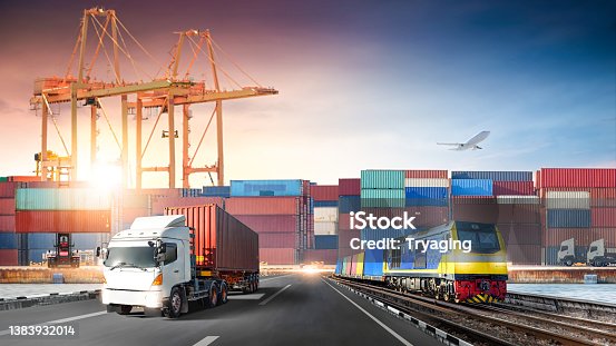 istock Global business logistics import export of red container truck on highway and freight train at port cargo shipping dock yard, Cargo airplane, Transportation industry concept, Depth blur effect 1383932014