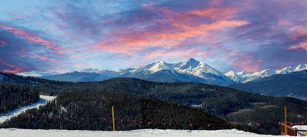 Ski slopes end into the beautiful mountain ranges of the Colorado Continental Divide.