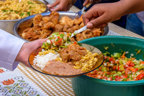 Simple and traditional Brazilian food being served in a popular restaurant Simple and traditional Brazilian food being served in a popular restaurant for the local low-income population. rice food staple stock pictures, royalty-free photos & images